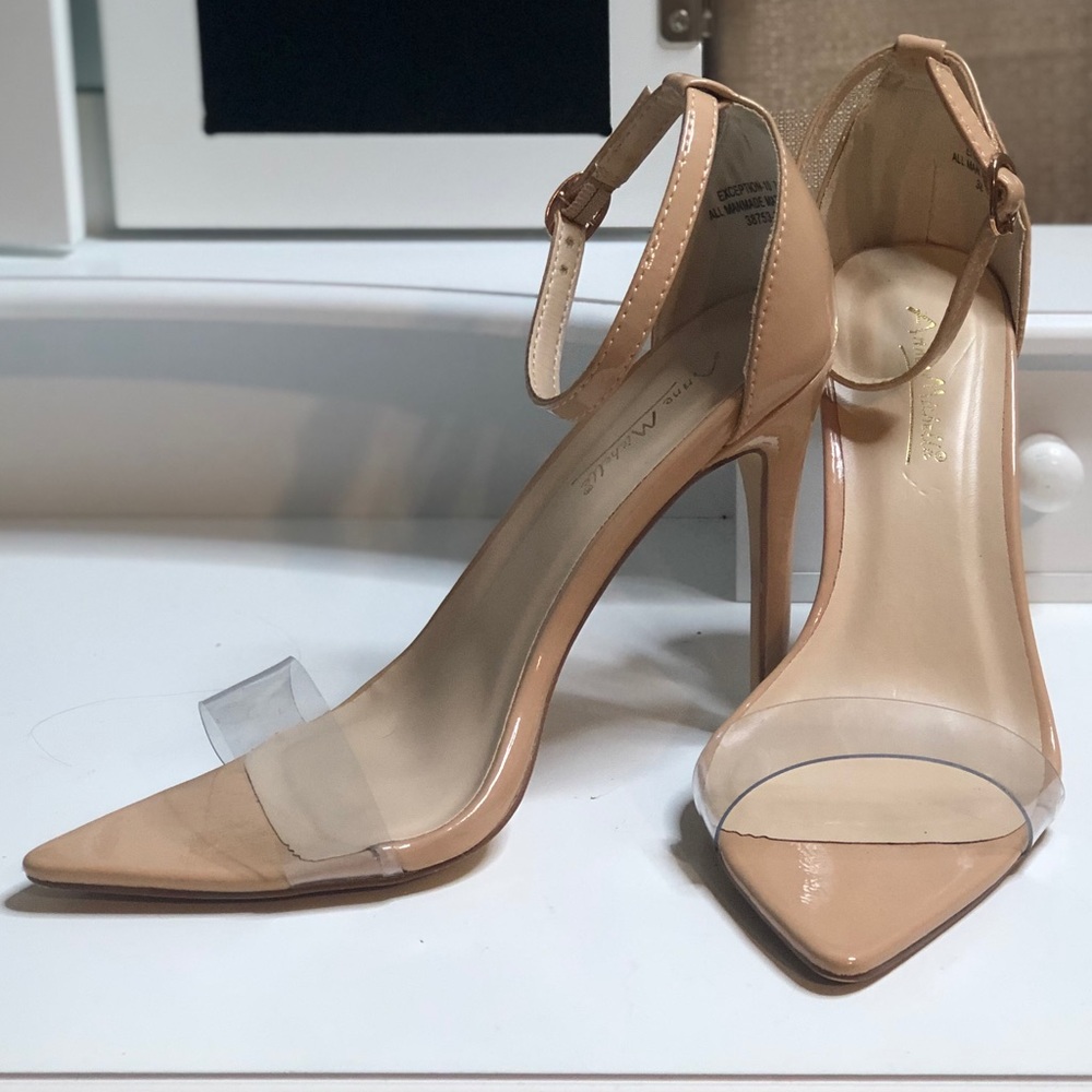 Nude pointed heels with clear strap